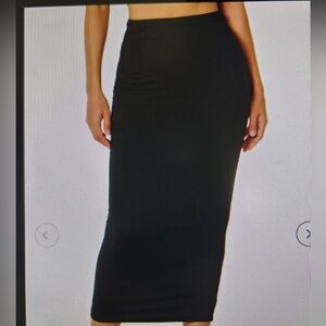 The Morgan black pencil skirt. Size medium.